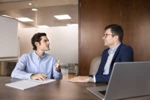 how to structure team member one-on-one meetings