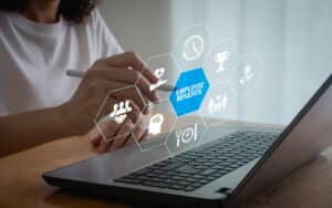 woman looking up her employee benefits on a computer