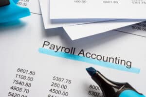 Documents with payroll accounting and marker