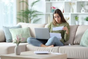 woman in disbelief after a payroll error